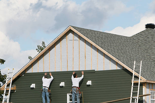 Professional Siding Installation technician working in Pipersville, PA